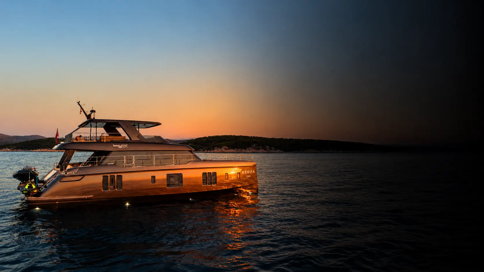 A luxurious catamaran facing the sunset in Adriatic.